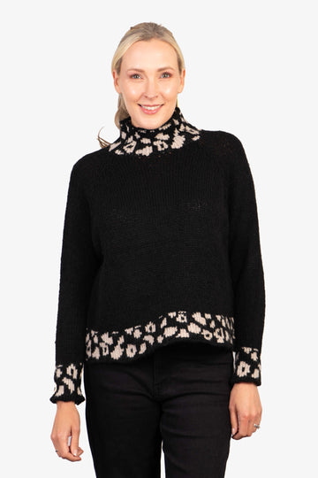 black long sleeve jumper with a high neck, the jumper features a contrasting beige leopard print pattern on the neck, trim and cuffs