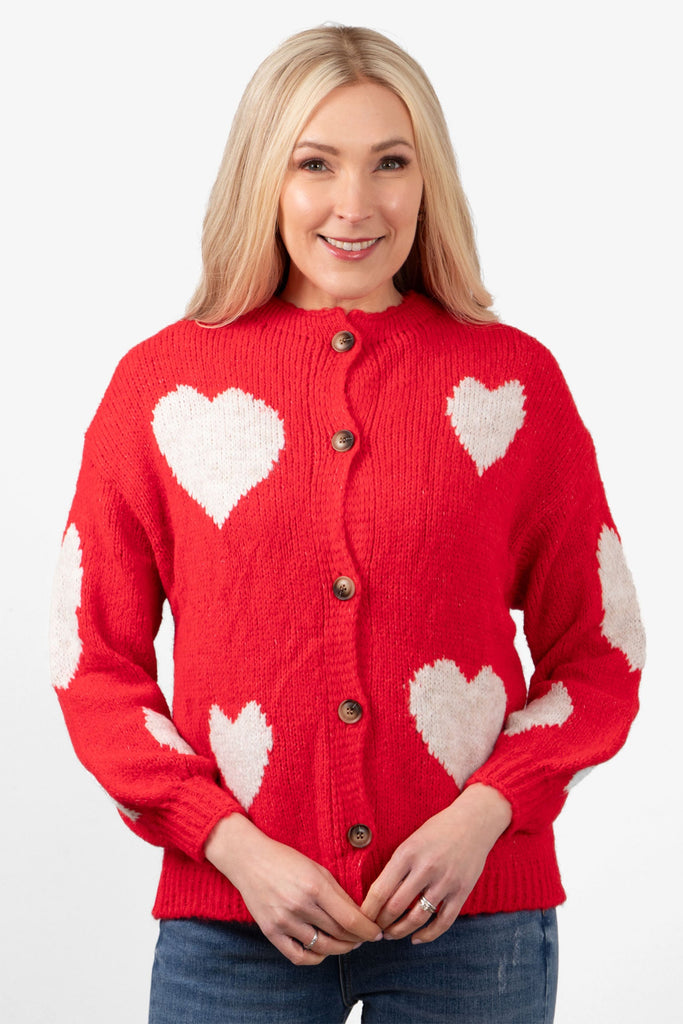 lexi-wool-blend-cardigan-red-cream-love-hearts-model-showing-front-of-the-cardigan