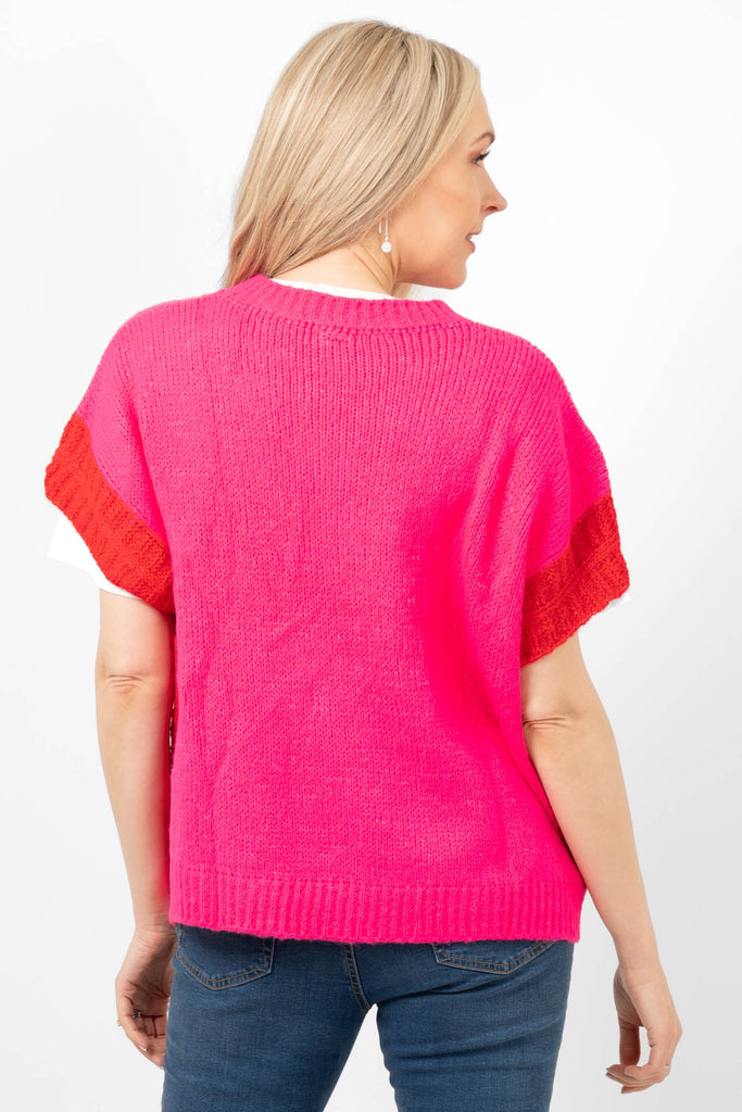 malia-wool-blend-tank-top-fuchsia-red-back-of-the-piece-shown-on-a-model-the-contrasting-sleeve-trims-are-visible