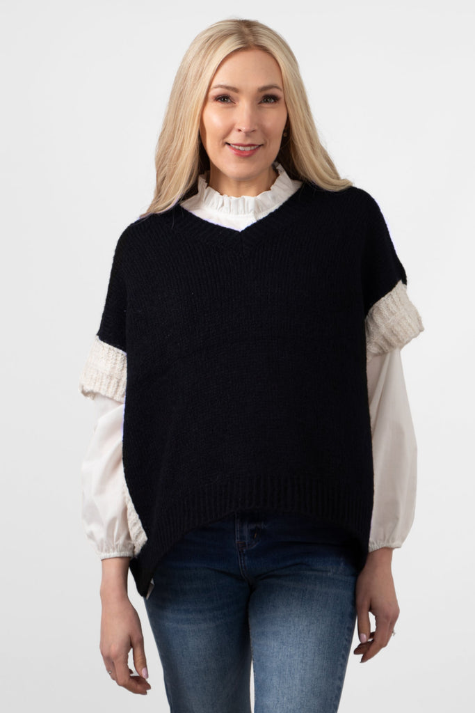 malia-wool-blend-tank-top-navy-blue-cream-styled-on-model-white-shirt-blue-jeans-casual