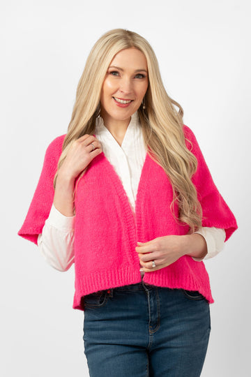 amelia-short-sleeve-wool-blend-cardigan-fuchsia-model-showing-the-front-view