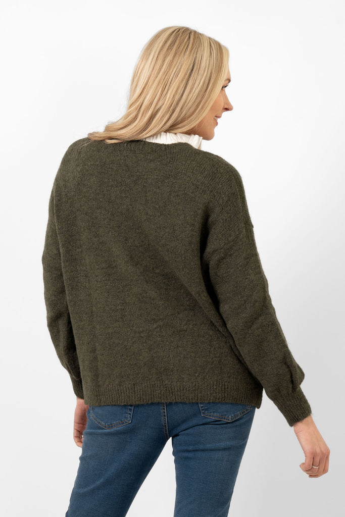 khaki green knitted cardigan shown from the back. the colour of the piece is  plain khaki green all over.
