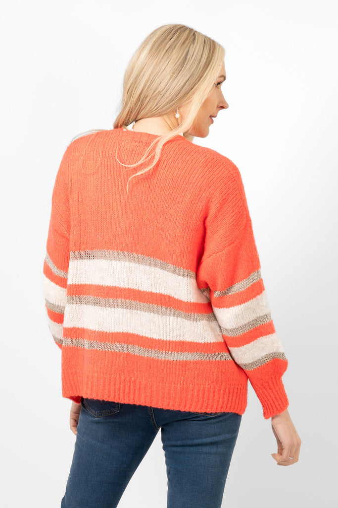 paris-wool-blend-striped-cardigan-cream-coral-gold-model-showing-the-back-the-striped-pattern-is-all-through-the-piece