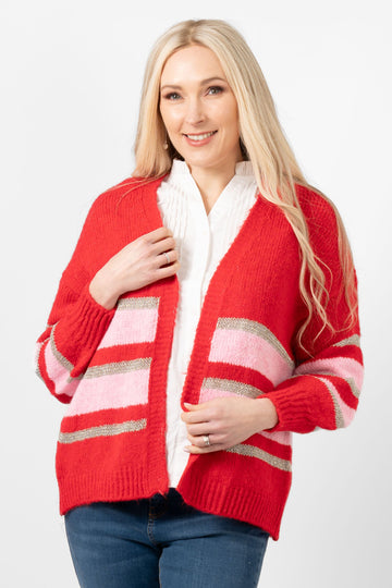 paris-wool-blend-cardigan-red-light-pink-gold-striped-model-wearing-the-cardigan-showing-the-front-view-highlighting-the striped-pattern