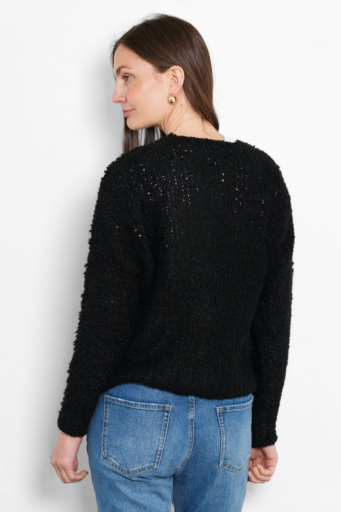collins-wool-blend-cardigan-black-boucle-model-rear-view-knitted