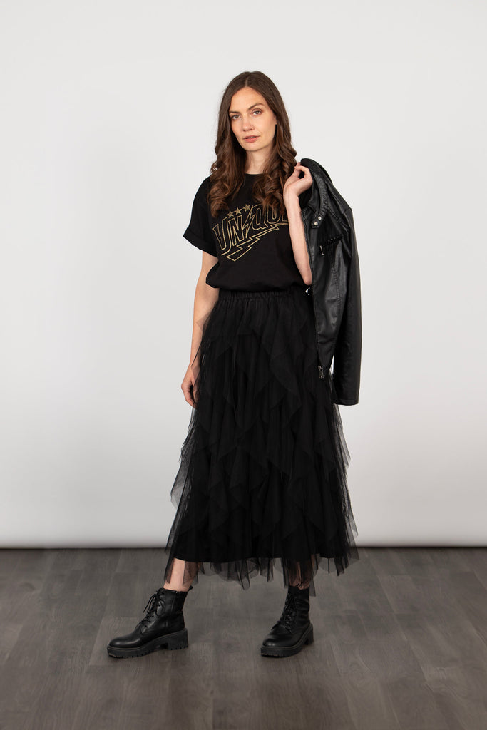 model wearing a black gathered tulle midi skirt with an elasticated waistband