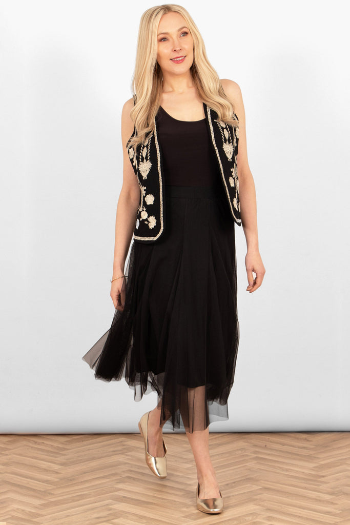 eden-tulle-midaxi-swing-skirt-black-styled-black-tank-top-embroidered-waistcoat