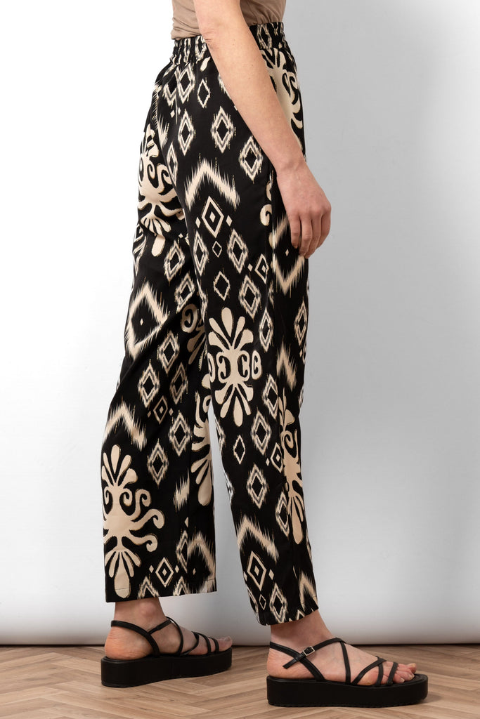 fifi-wide-leg-trousers-black-ikat-rear-view-pattern-covers-full-design