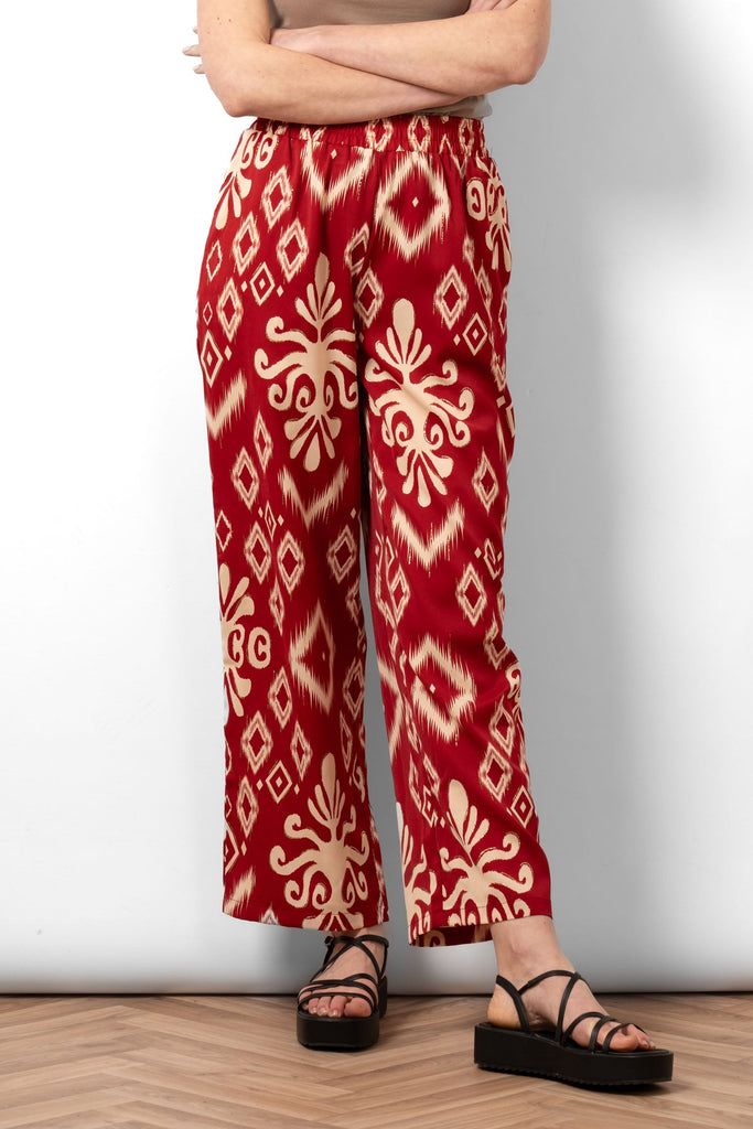 fifi-wide-leg-trousers-red-ikat-worn-on-model-front-view-full-length-elasticated-waist