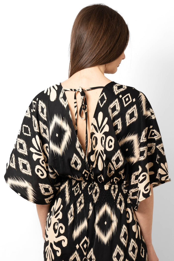 lyra-deep-v-neck-jumpsuit-black-ikat-open-back-neck-tie