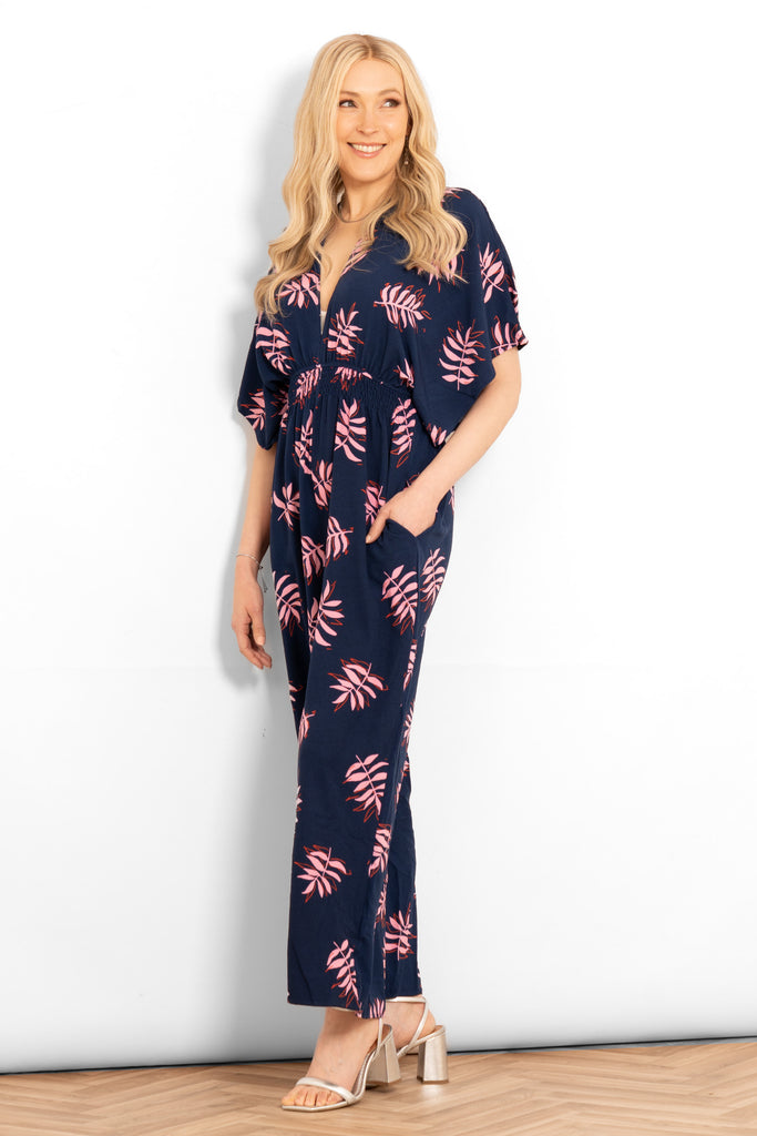 jilly-deep-v-jumpsuit-navy-blue-pink-palm-leaf-side-view-pocket
