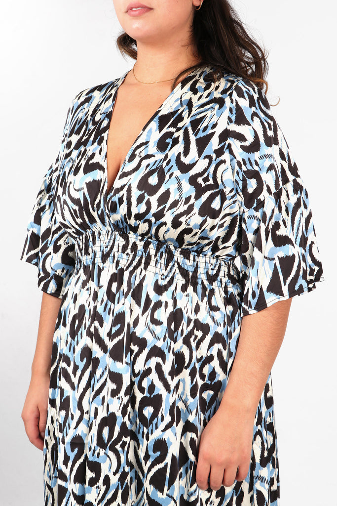 close up of the shirred waist and v neck