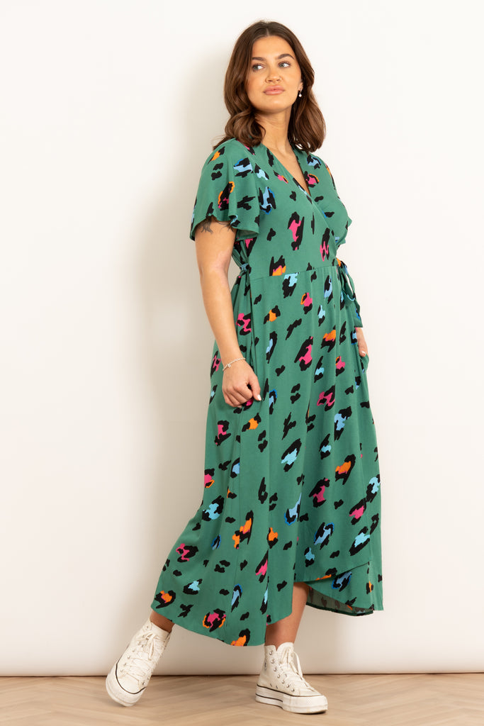 addie-short-sleeve-wrap-dress-green-multi-large-leopard-print-styled-model