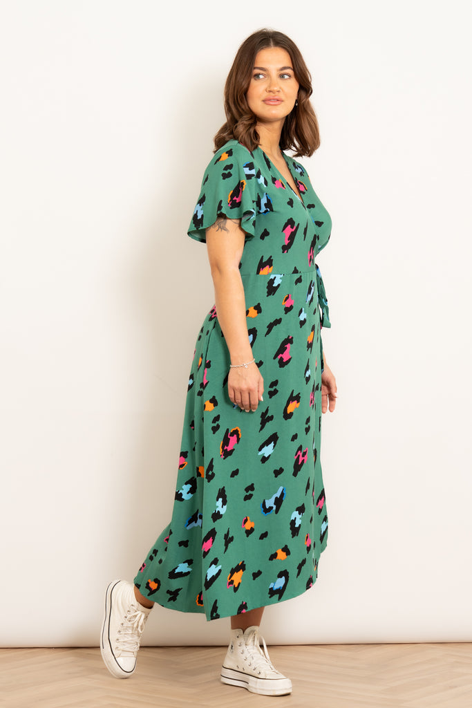 addie-short-sleeve-wrap-dress-green-multi-large-leopard-print-side-view-model