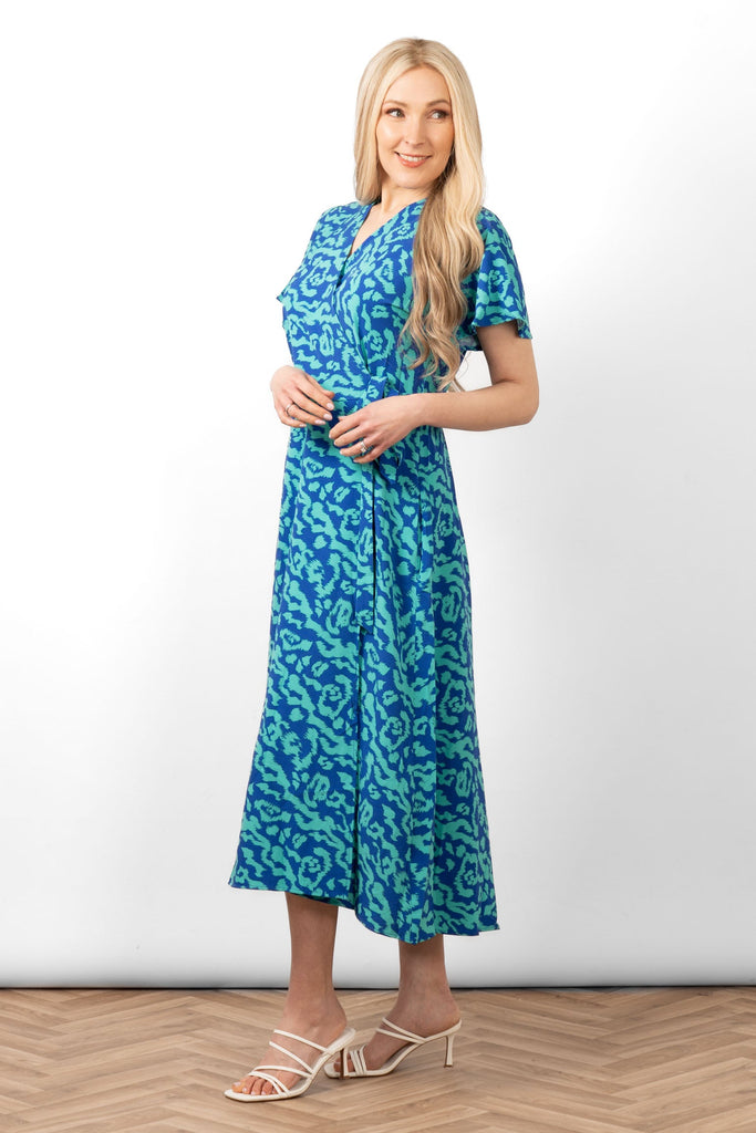 addie-short-sleeve-wrap-dress-blue-animal-print-side-view-tie-waist-v-neck