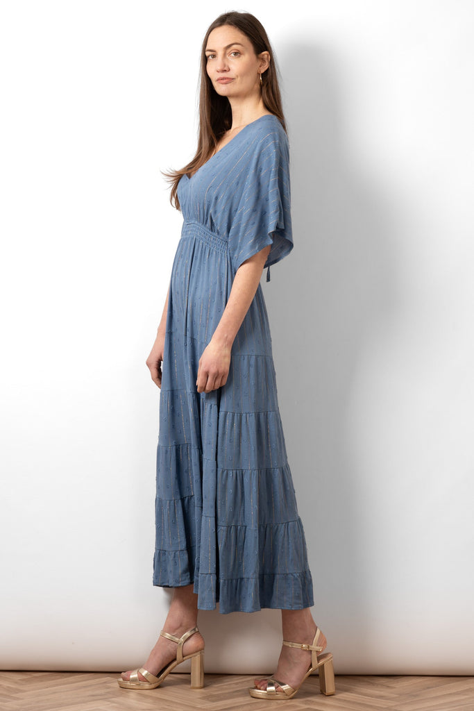 sienna-maxi-kaftan-dress-denim-blue-gold-metallic-stripe-side-view-tiered-skirt