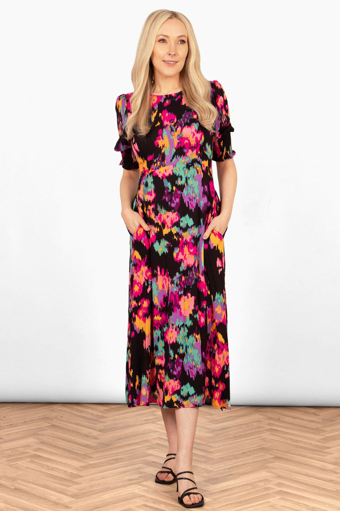 hazel-midi-tea-dress-black-multi-abstract-floral-colourful-pinks-yellow-greens-puff-sleeves-pockets