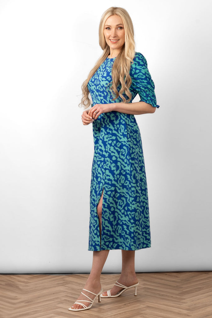 hazel-midi-tea-dress-blue-animal-print-rear-view-shirred-waist-button-neck