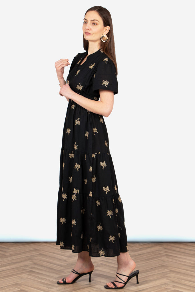 ines-tiered-cotton-maxi-dress-black-gold-embroidered-floral-loose-fit