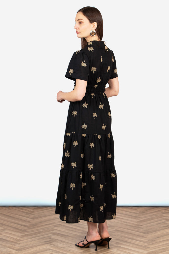 ines-tiered-cotton-maxi-dress-black-gold-embroidered-floral-short-sleeve