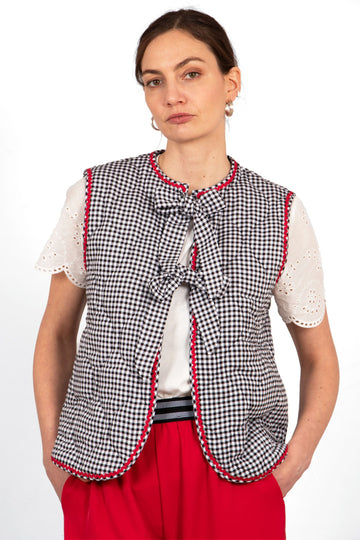 noa-quilted-gilet-black-gingham-on-model-front-view-checked-sleeveless-jacket