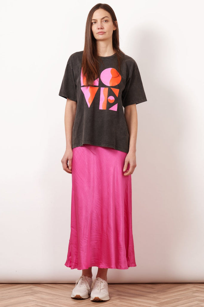Cassie-Midi-Slip-Skirt-Pink-Styled-With-Love-Print-Black-Graphic-Tee