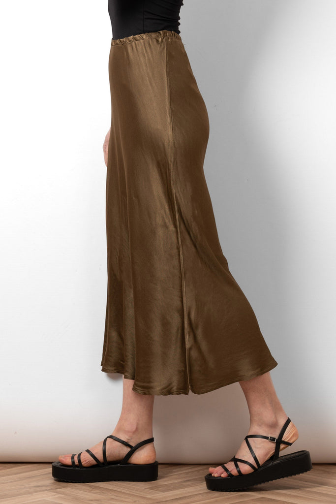 cassie-midi-slip-skirt-khaki-side-view-midcalf-length-bias-cut