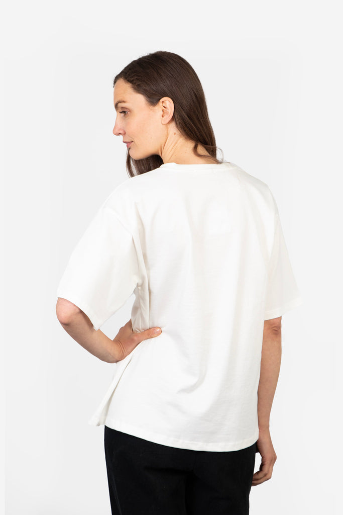 model showing the back of the t-shirt which is plain white