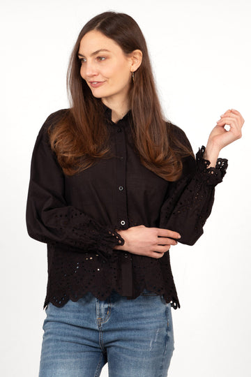 hattie-long-sleeve-shirt-black-broderie-anglaise-model-showing-front-view-delicate-cut-out-floral-pattern