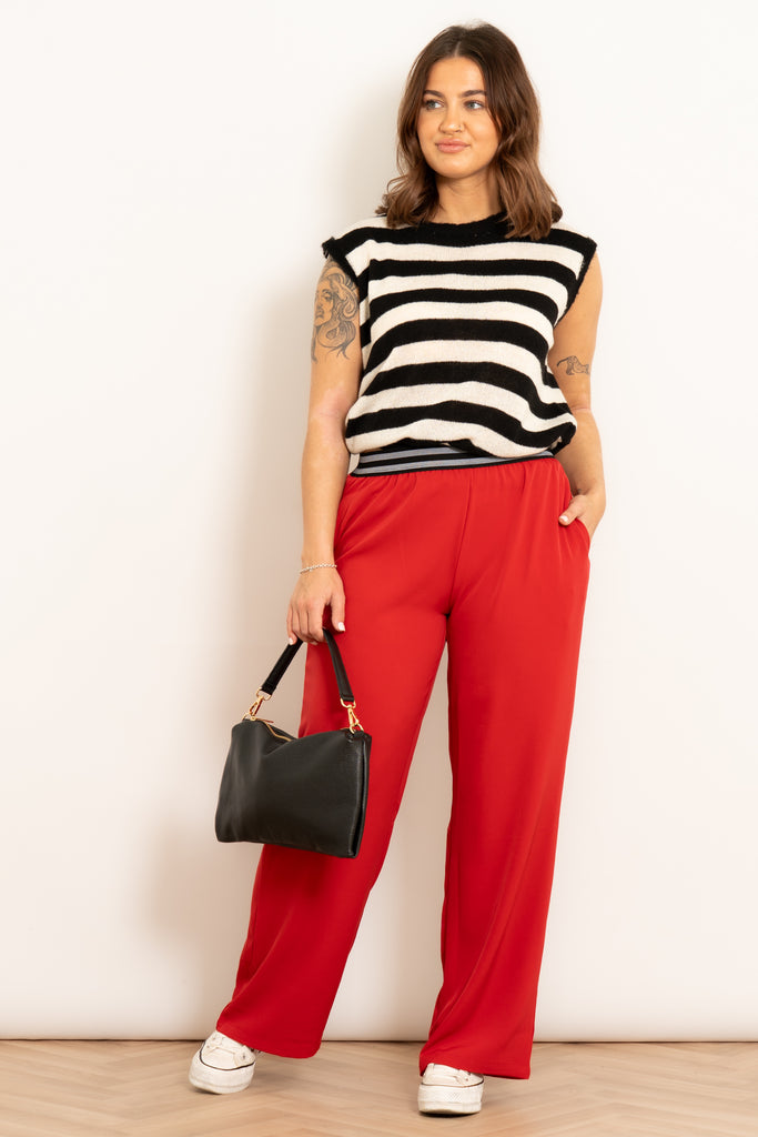 amber-wide-leg-trousers-red-styled-on-model-front-view