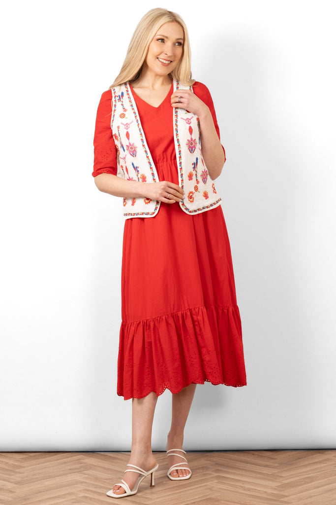 aubrey-lightweight-waistcoat-white-multi-floral-embroidery-styled-with-red-midi-dress-white-sandals