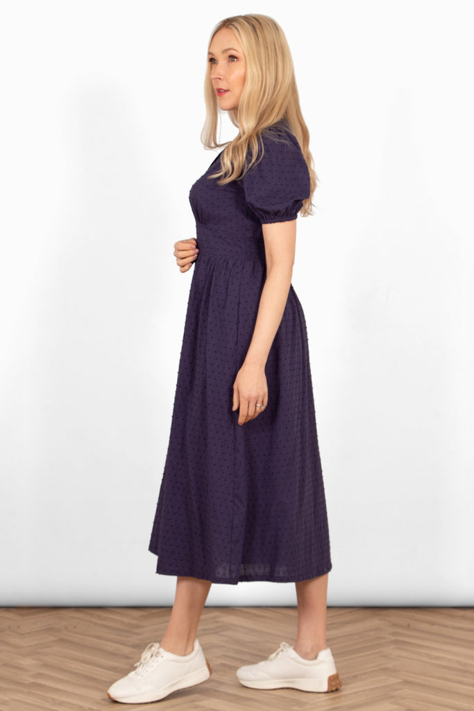 poppy-cotton-button-down-midi-tea-dress-navy-blue-dobby-side-view-puff-sleeves