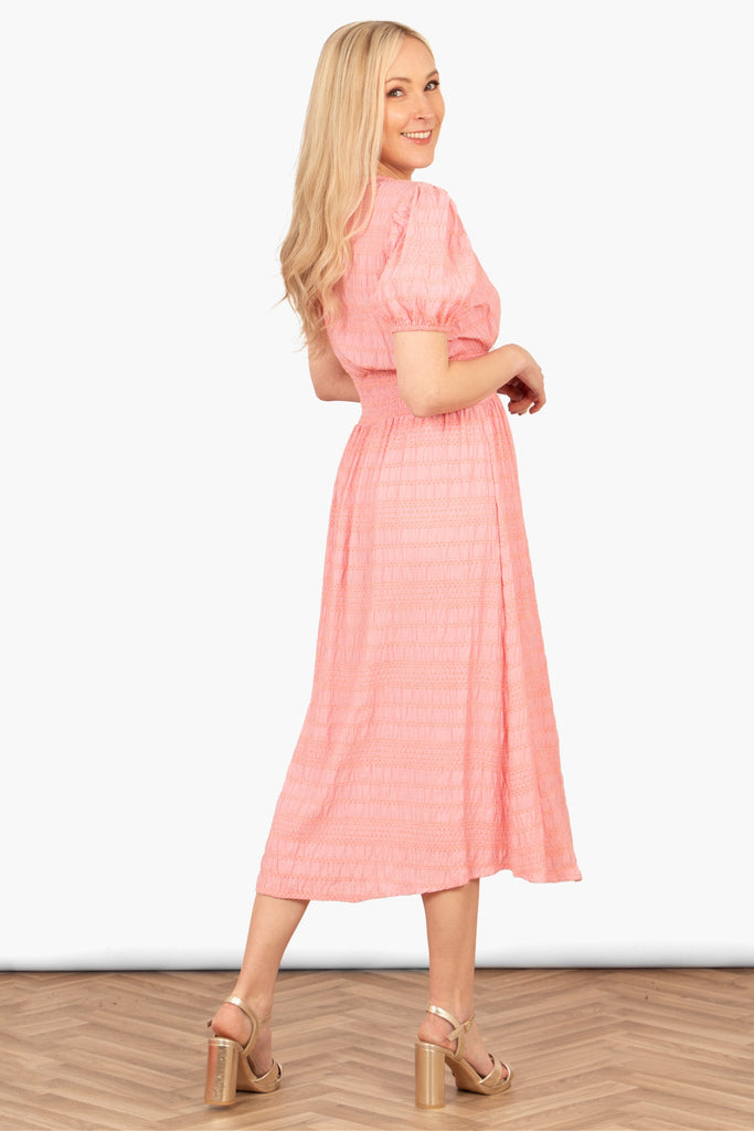 oliva-button-front-midi-tea-dress-coral-asymmetric-stripe-rear-view-shirred-waist