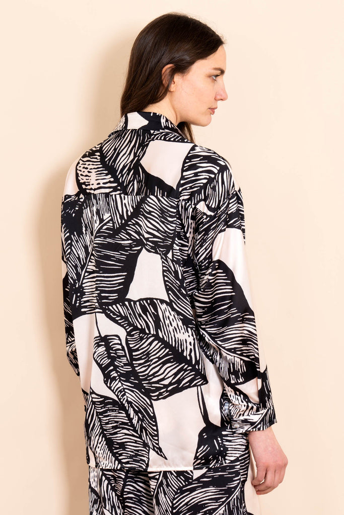 birdie-long-sleeve-blouse-black-cream-palm-leaf-rear-view-patterned
