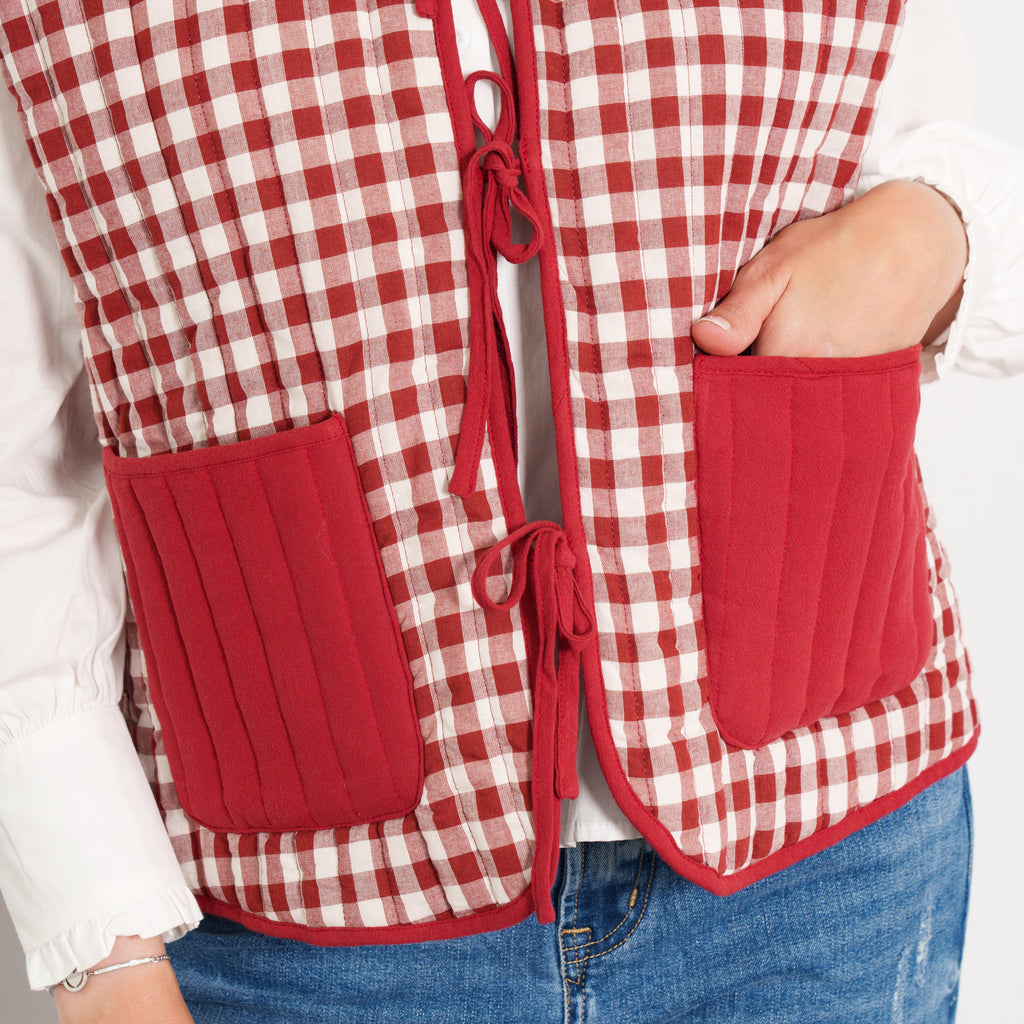 tabby-quilted-reversible-gilet-red-cream-gingham-close-up-front-ties