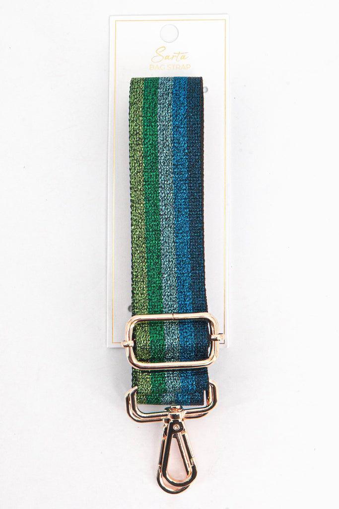 green and blue glitter bag strap in its sarta packaging