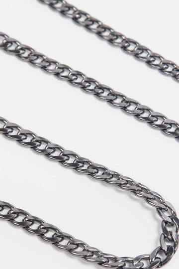 close up of the pewter cuban chain link bag strap