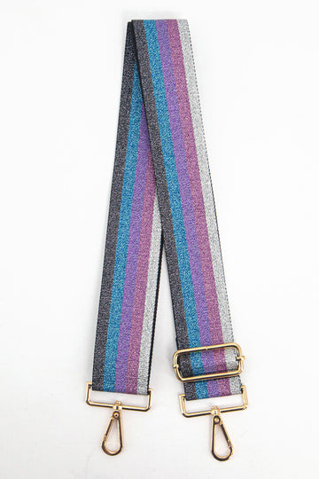  blue and purple vertical rainbow striped bag strap with an all over glitter sparkle and gold hardware