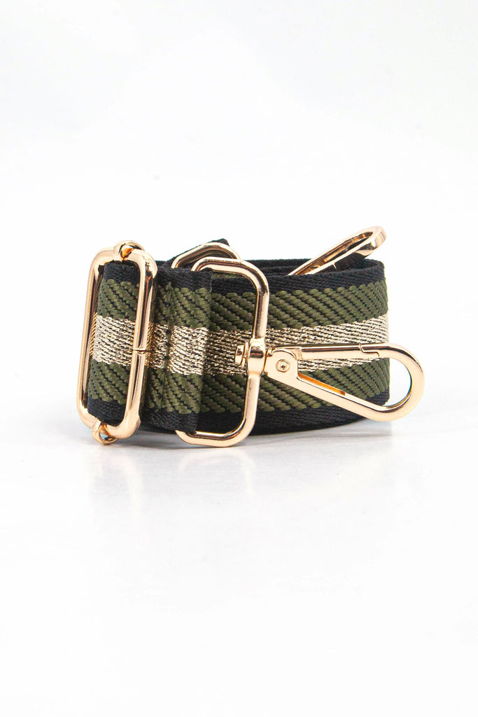 showing the bag strap coiled around itself, the khaki green and gold glitter stripe pattern woven design is prominent , the gold hardware is shown in close up
