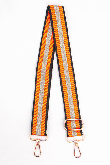 orange bag strap with a gold glitter centre stripe and gold hardware