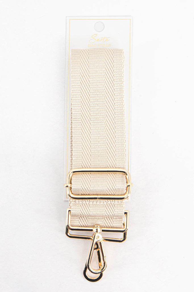 cream woven bag strap in its sarta packaging