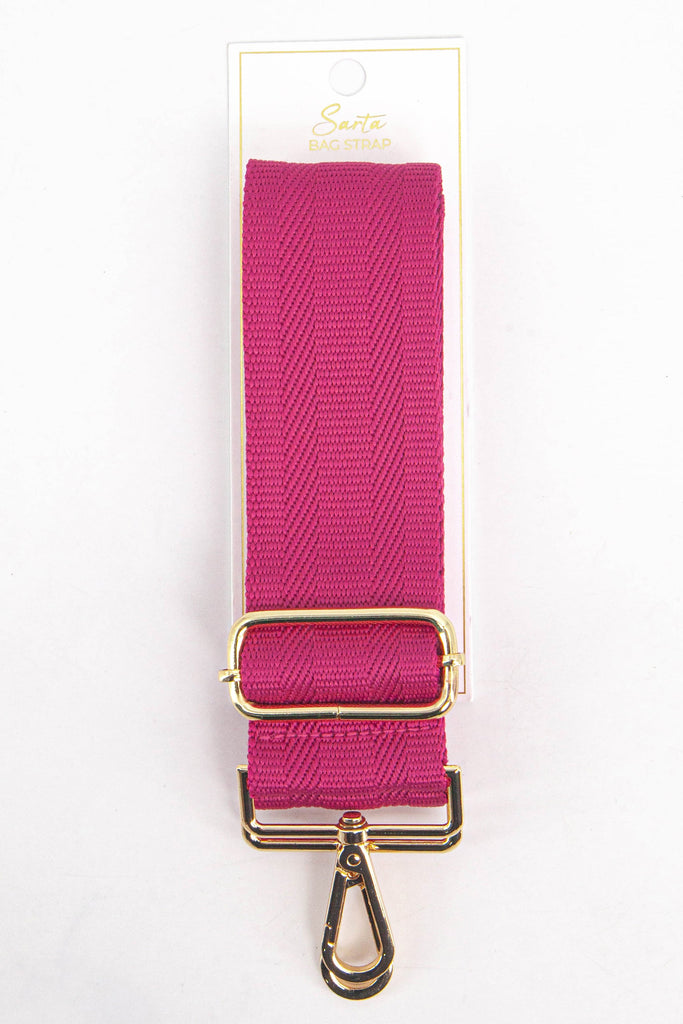 fuchsia pink woven bag strap in its sarta packaging