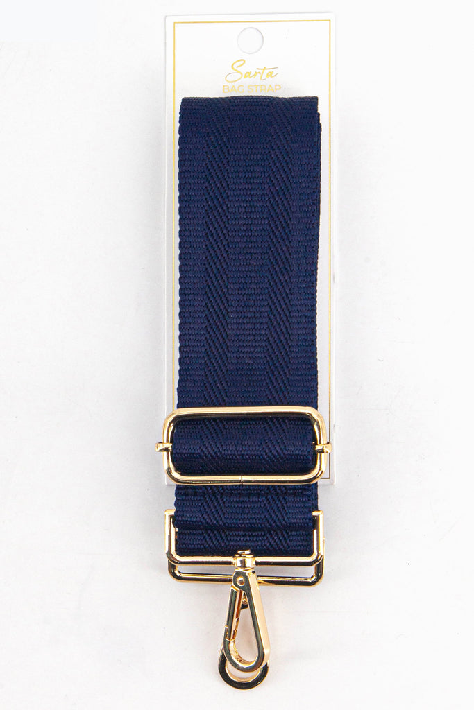 navy blue woven bag strap in its sarta packaging