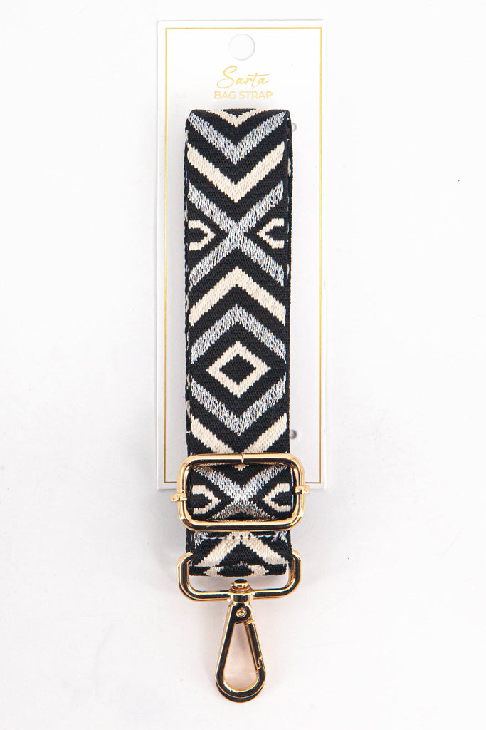grey and silver aztec pattern woven bag strap in its sarta packaging