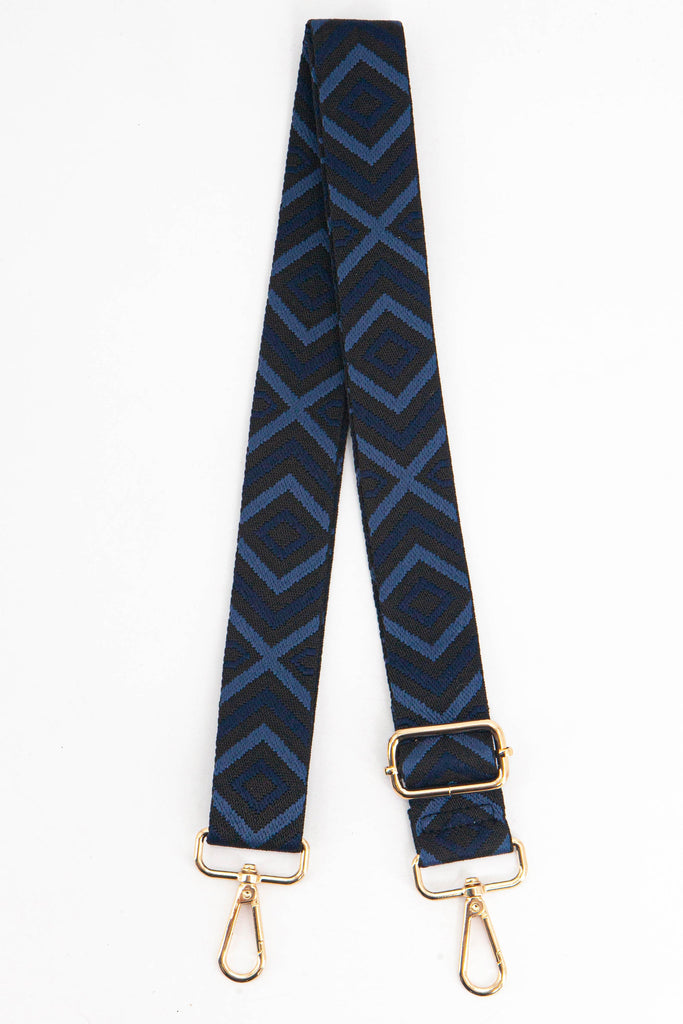 navy blue aztec print woven bag strap, the strap is adjustable and has gold hardware