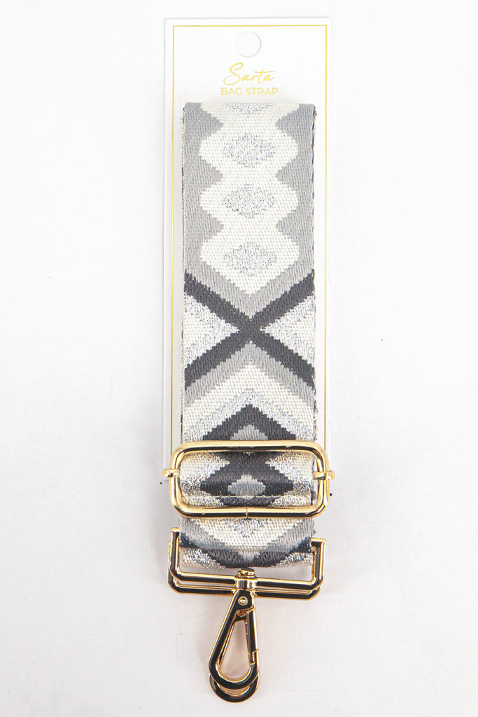 metallic grey aztec woven bag strap in its sarta packaging