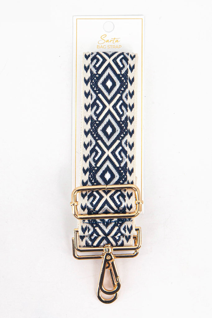 black and silver geometric woven bag strap in its sarta packaging