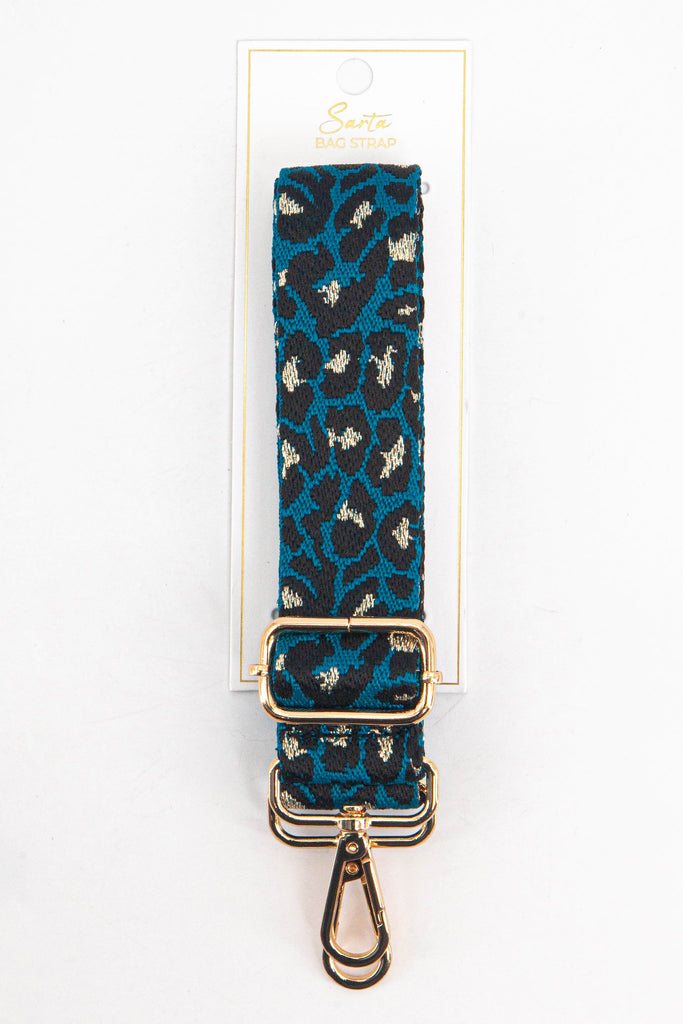  blue black and gold leopard print woven bag strap in its sarta packaging