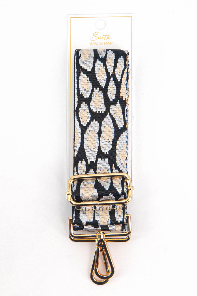 black and  gold animal print woven bag strap in its sarta packaging