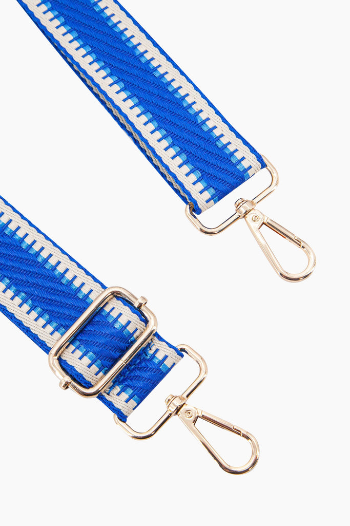 emerson-woven-bag-strap-royal-blue-striped-trim-close-up-gold-snap-hoop-attachments